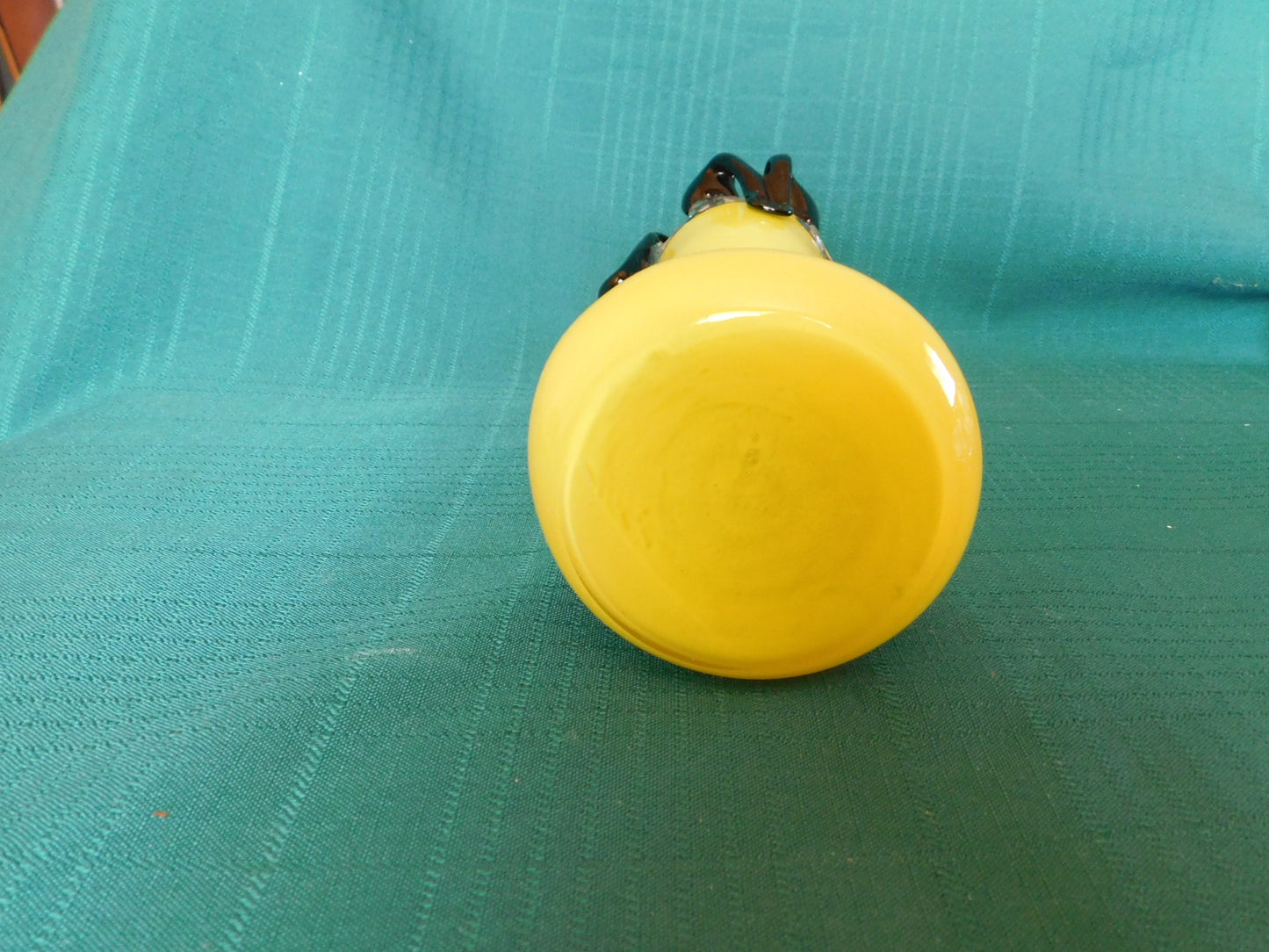 Yellow and black art glass vase near mint condition