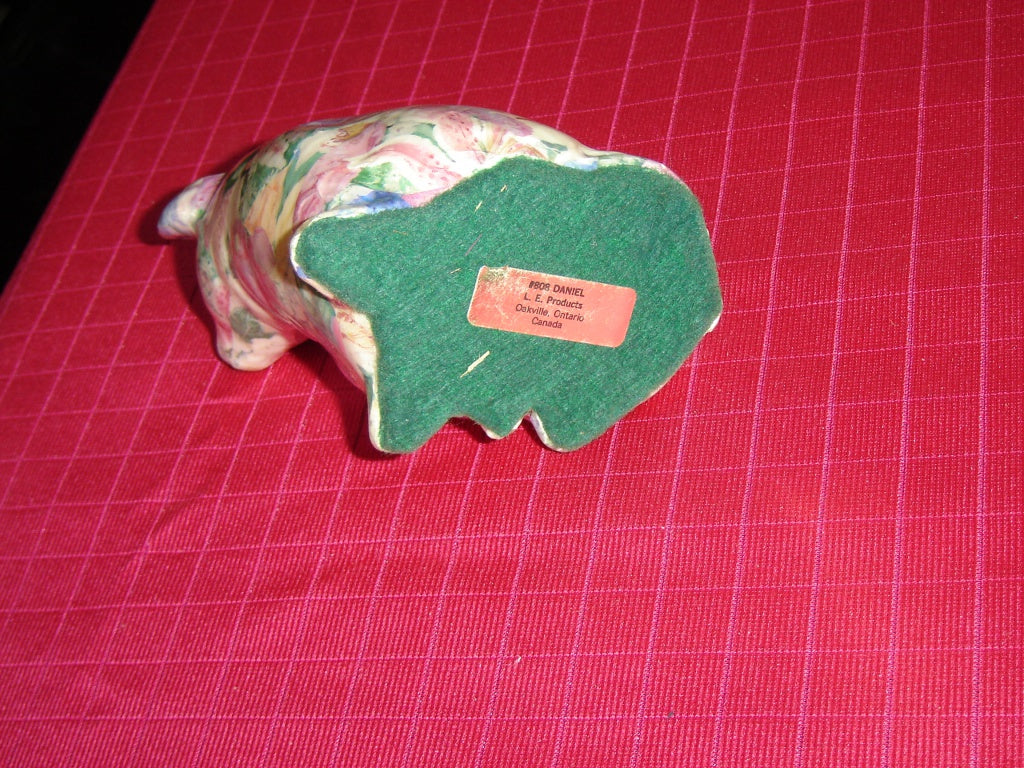 Attentive glazed paper mache pig