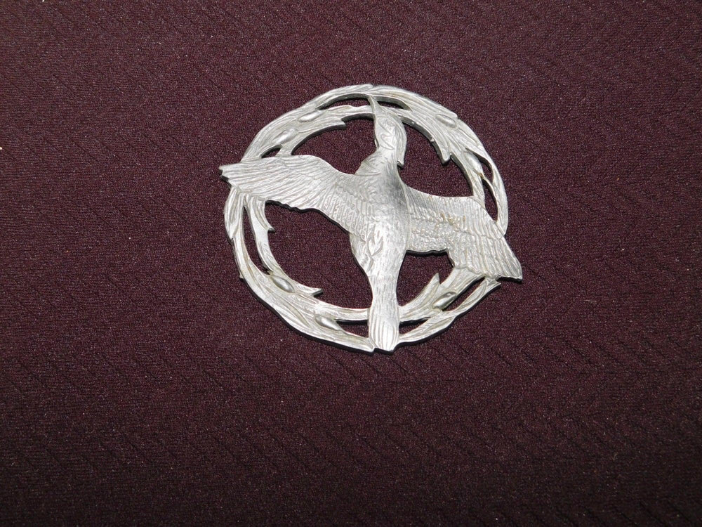 Pewter flying bird trivet or coaster