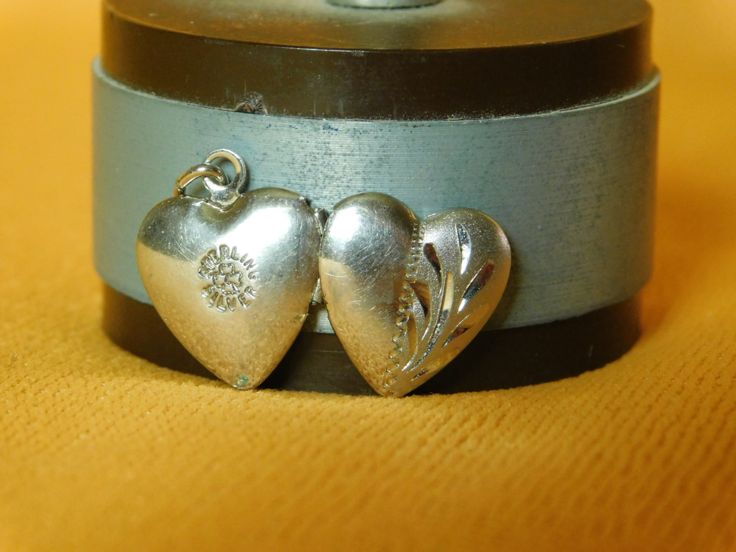 Mini sterling silver heart shaped locket near mint condition