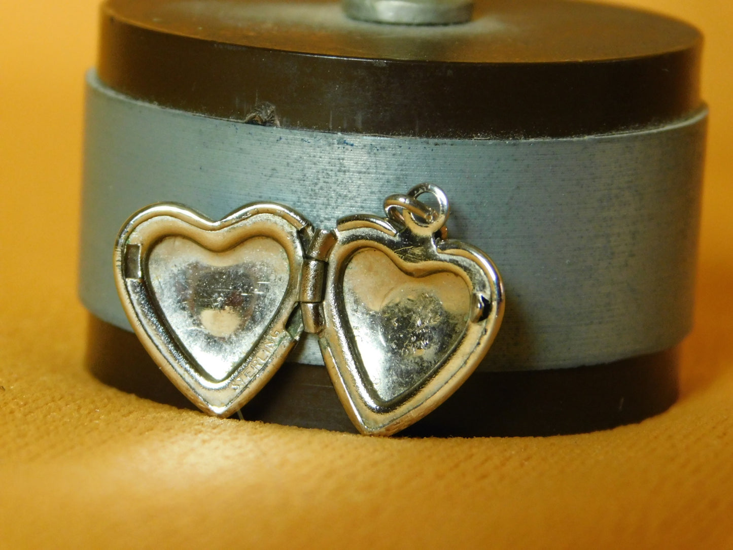 Mini sterling silver heart shaped locket near mint condition