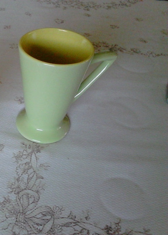 Retro style green and yellow mug near mint condition