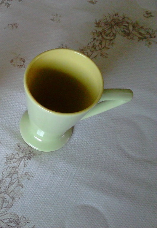 Retro style green and yellow mug near mint condition