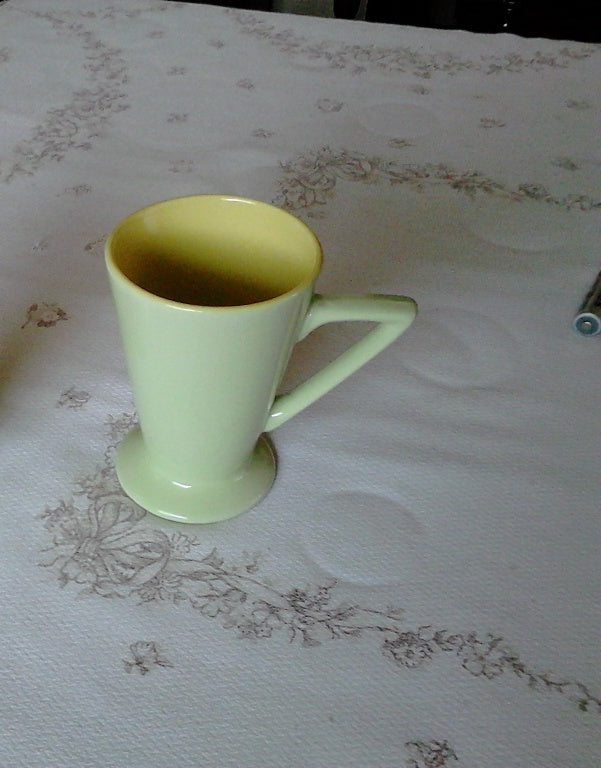 Retro style green and yellow mug near mint condition