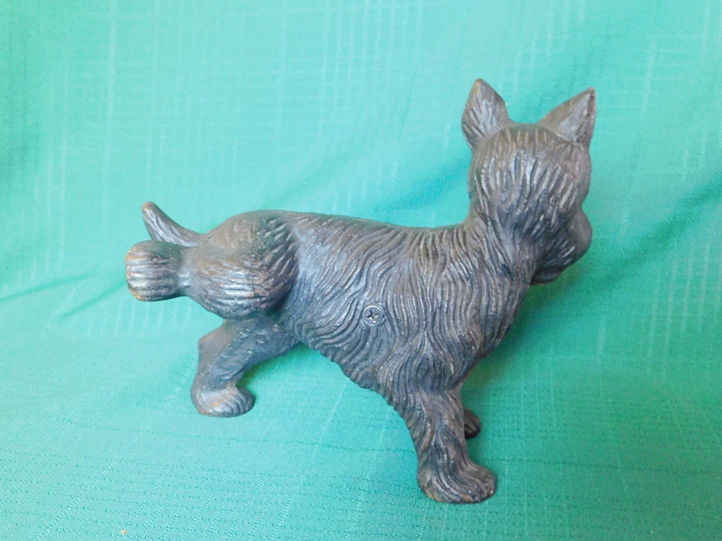 Vintage cast iron Scottish Terrier leg up door stop VGU