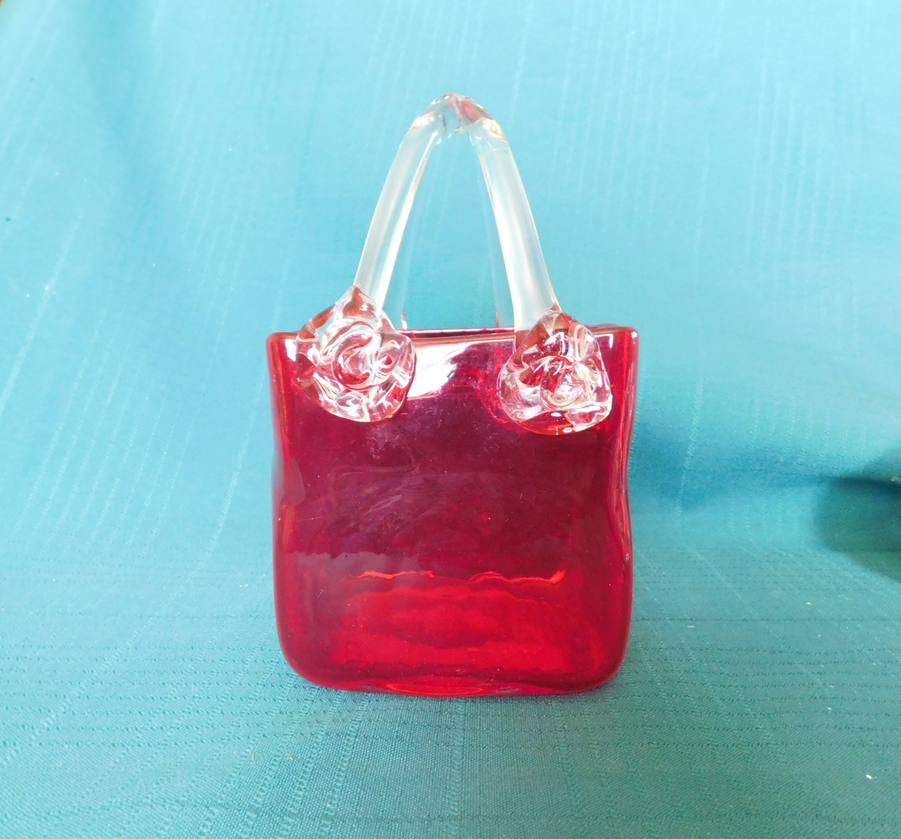 Red and clear art glass basket near mint condition