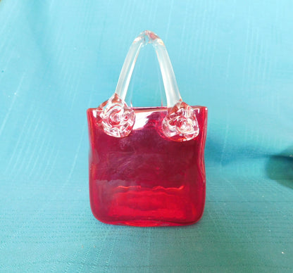 Red and clear art glass basket near mint condition