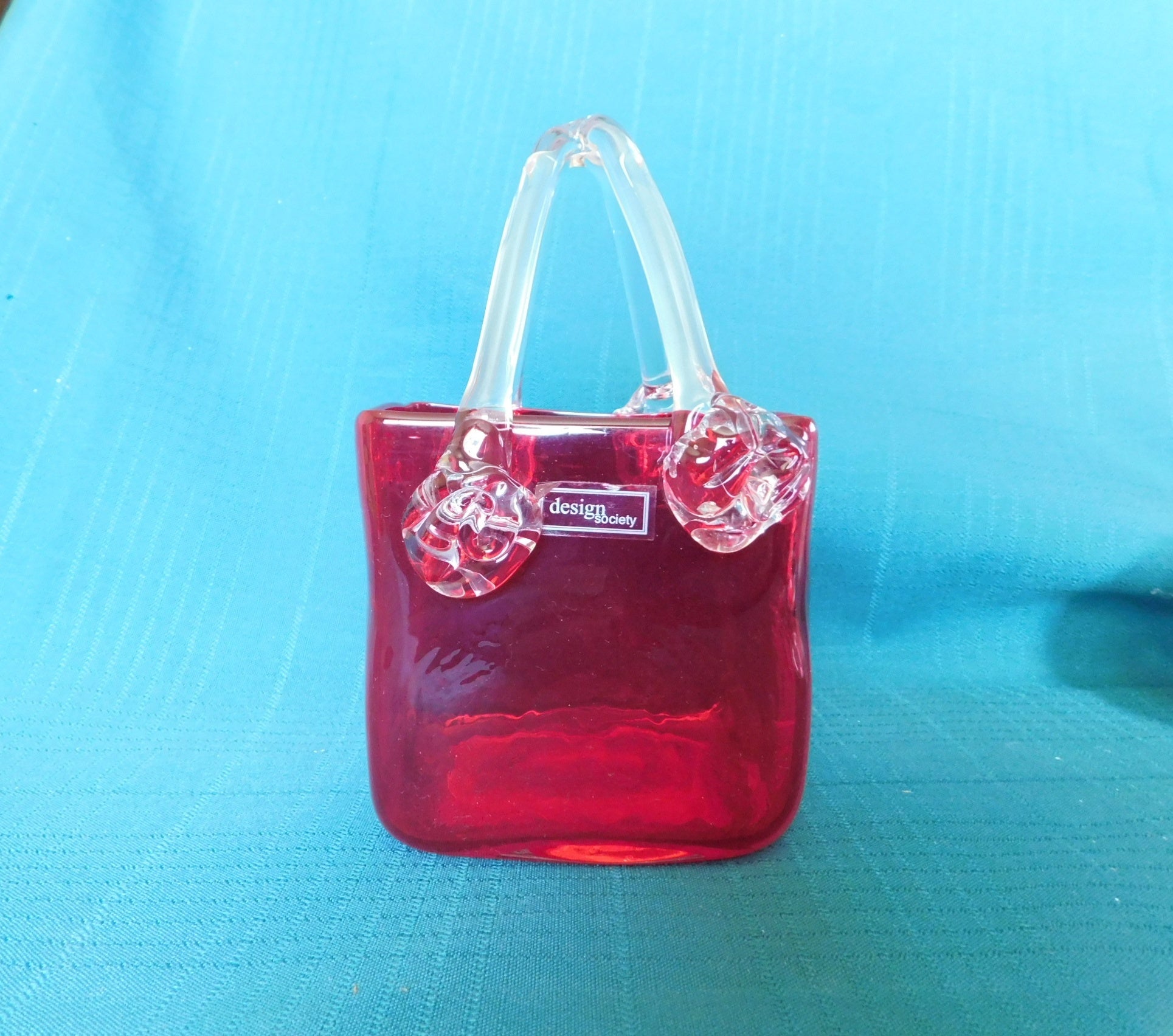 Red and clear art glass basket near mint condition