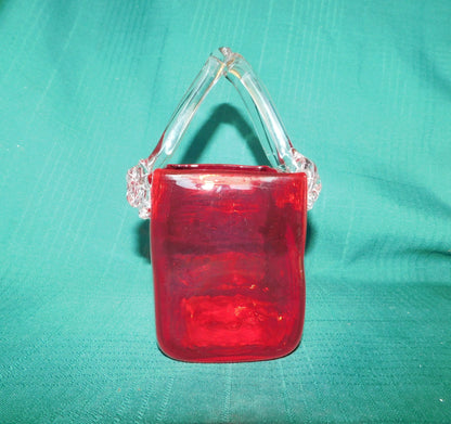 Red and clear art glass basket near mint condition