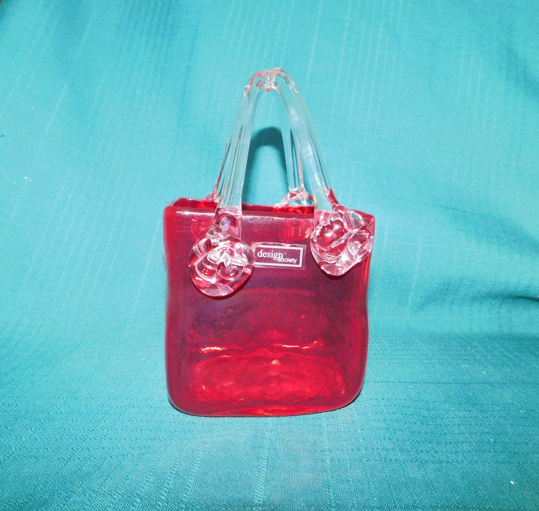 Red and clear art glass basket near mint condition