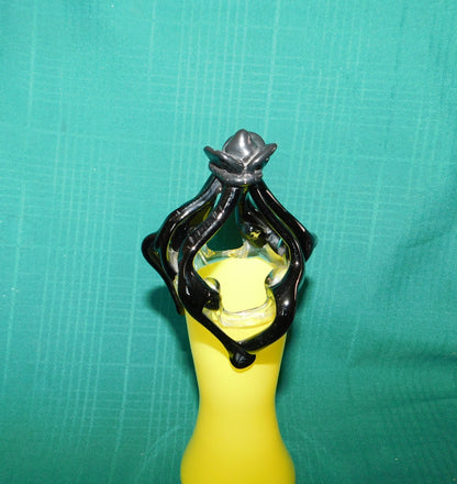 Yellow and black art glass vase near mint condition
