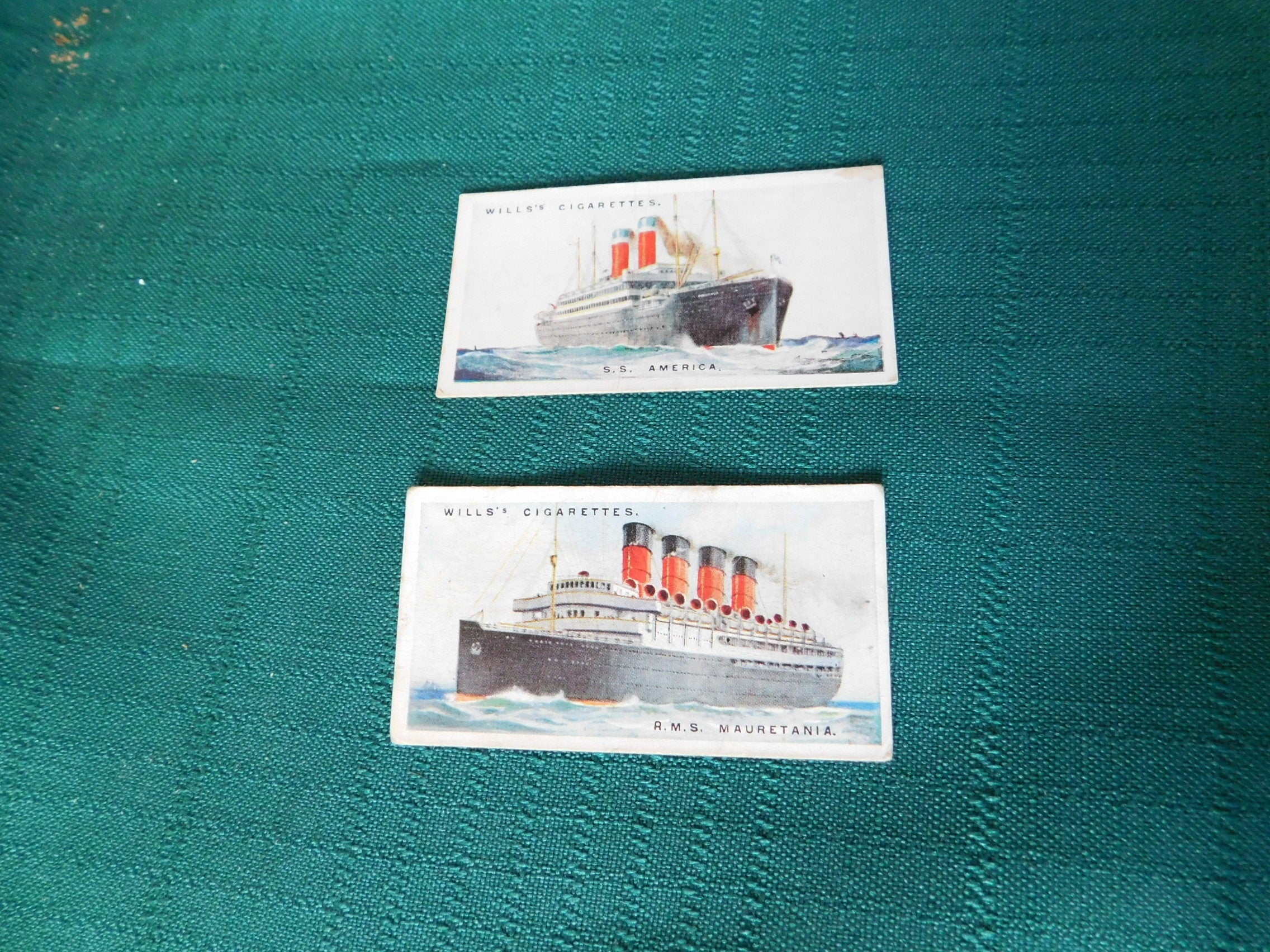 Wills's Cigarettes numbers 16 and 36 Merchant Ships (1925) tobacco cards