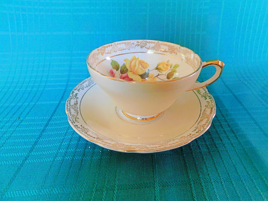 Sutherland 3334 yellow pink Roses yellow band cup and saucer GUC