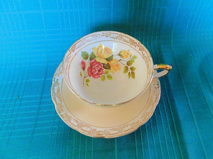 Sutherland 3334 yellow pink Roses yellow band cup and saucer GUC
