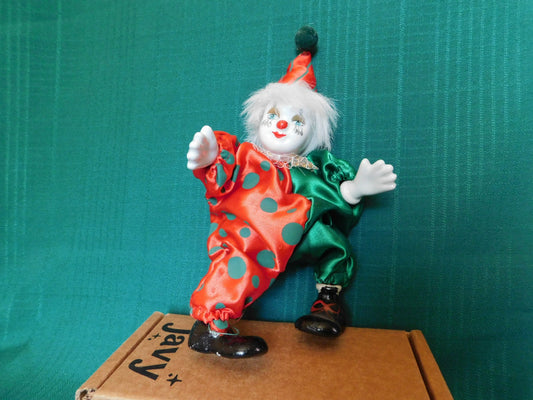 Porcelain red green clown doll VGU