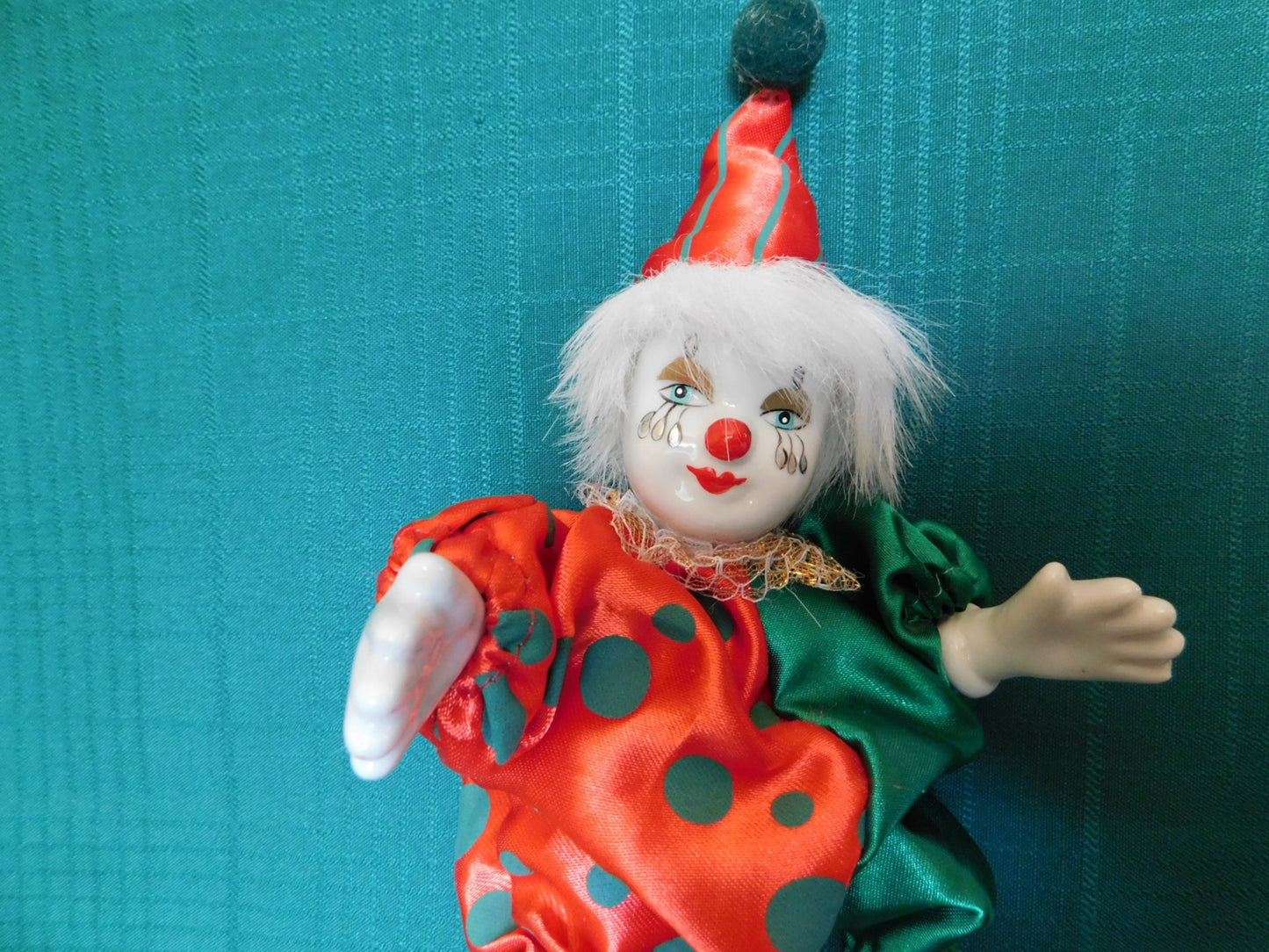 Porcelain red green clown doll VGU