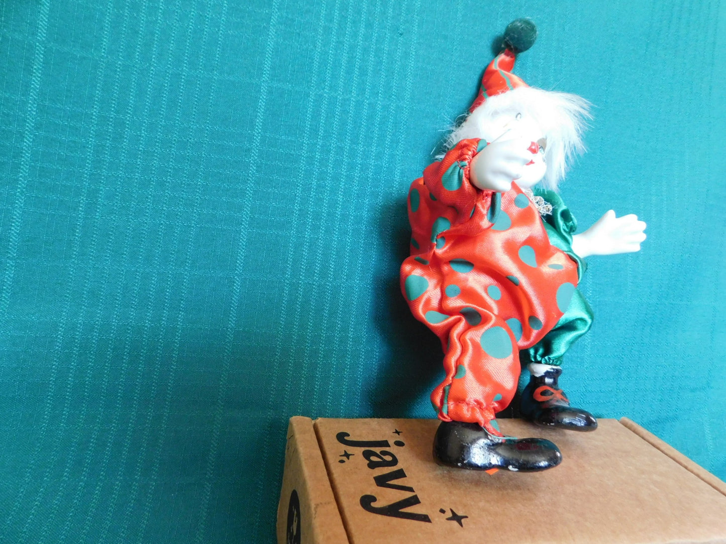 Porcelain red green clown doll VGU