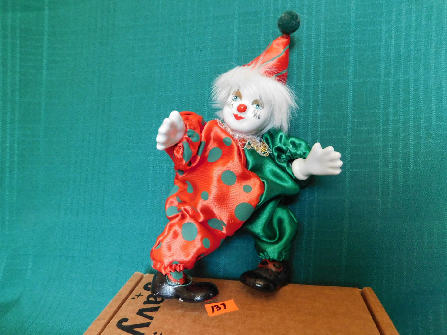 Porcelain red green clown doll VGU