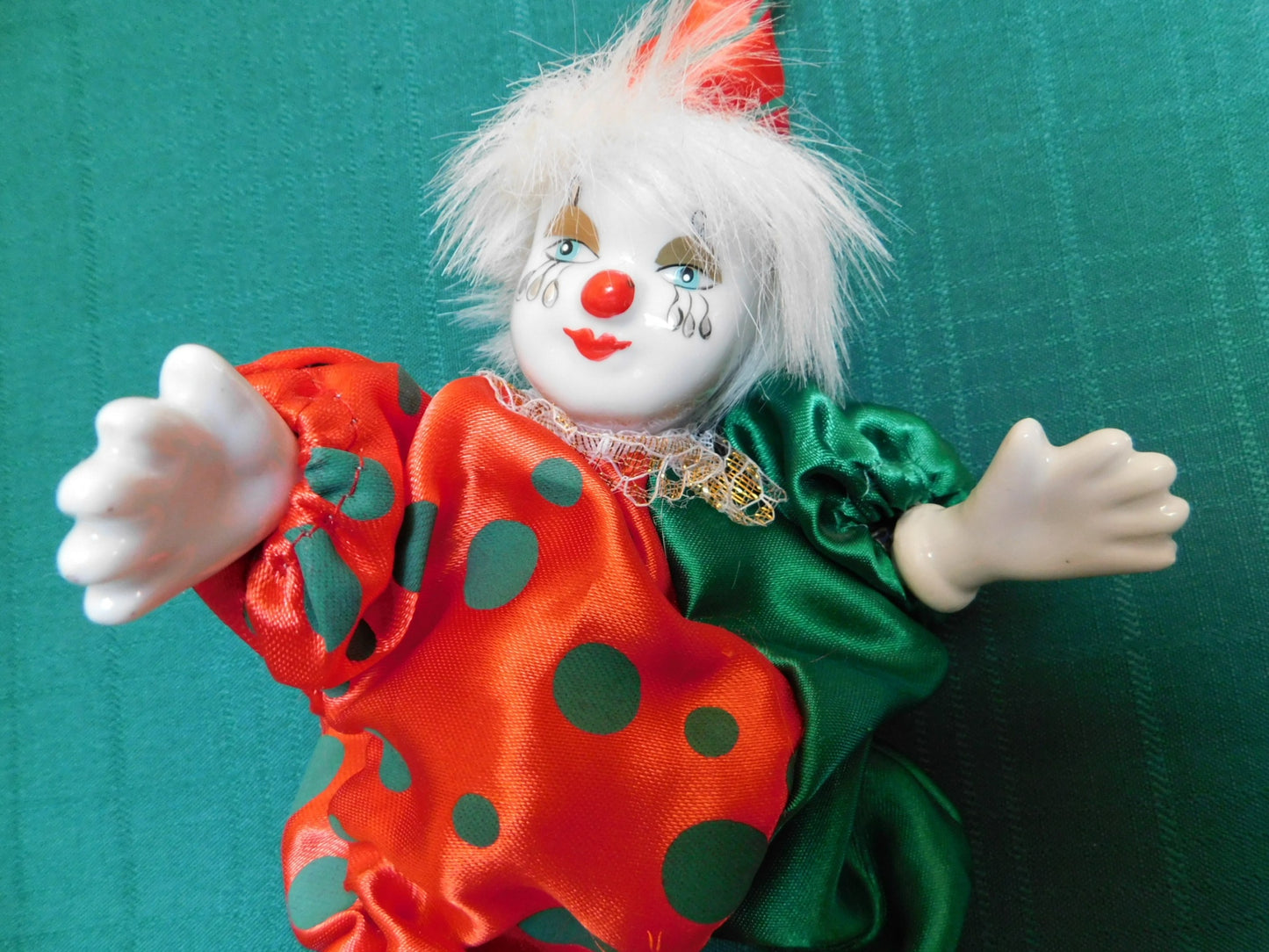 Porcelain red green clown doll VGU