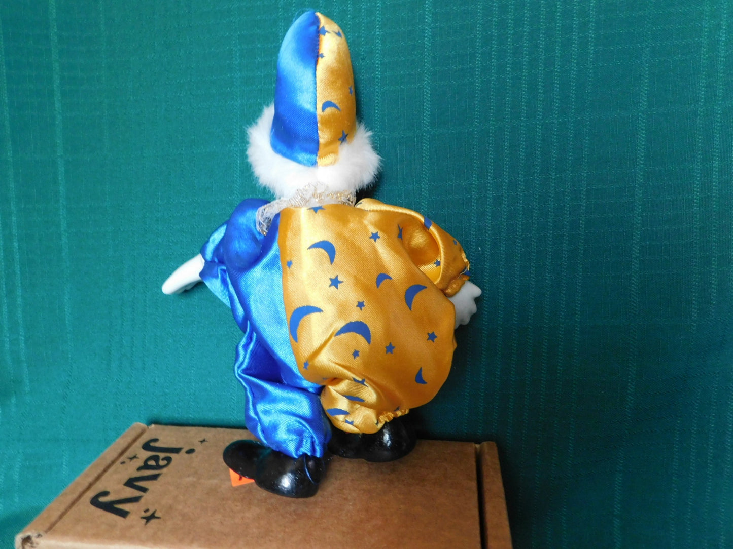 Porcelain blue gold clown doll near mint condition