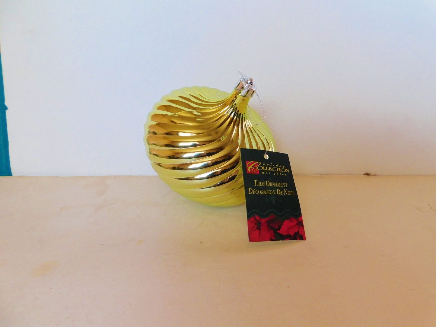 Gold flattened orb shape tree ornament new with tag