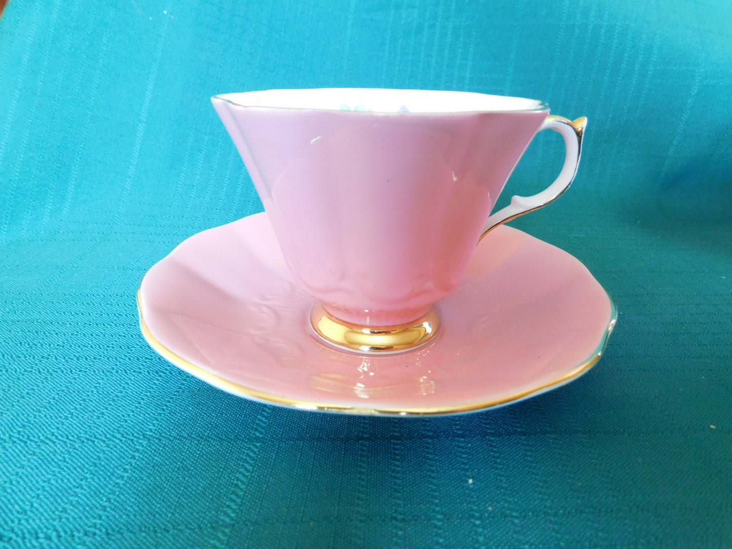Rare Queen Anne 280 solid pink exterior floral interior cup and saucer