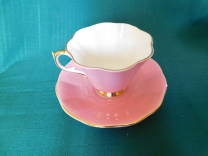 Rare Queen Anne 280 solid pink exterior floral interior cup and saucer