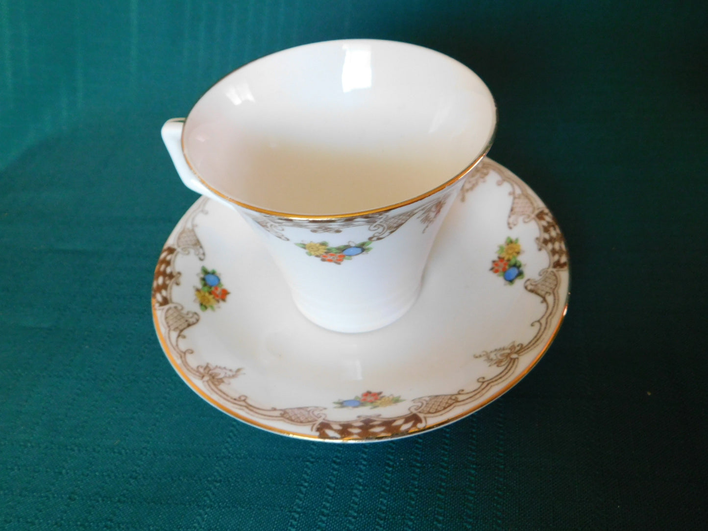 Radfords Joy floral and beige scroll cup and saucer VGU