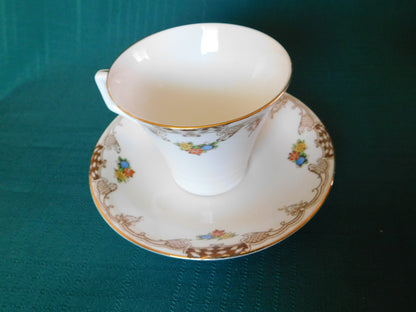 Radfords Joy floral and beige scroll cup and saucer VGU