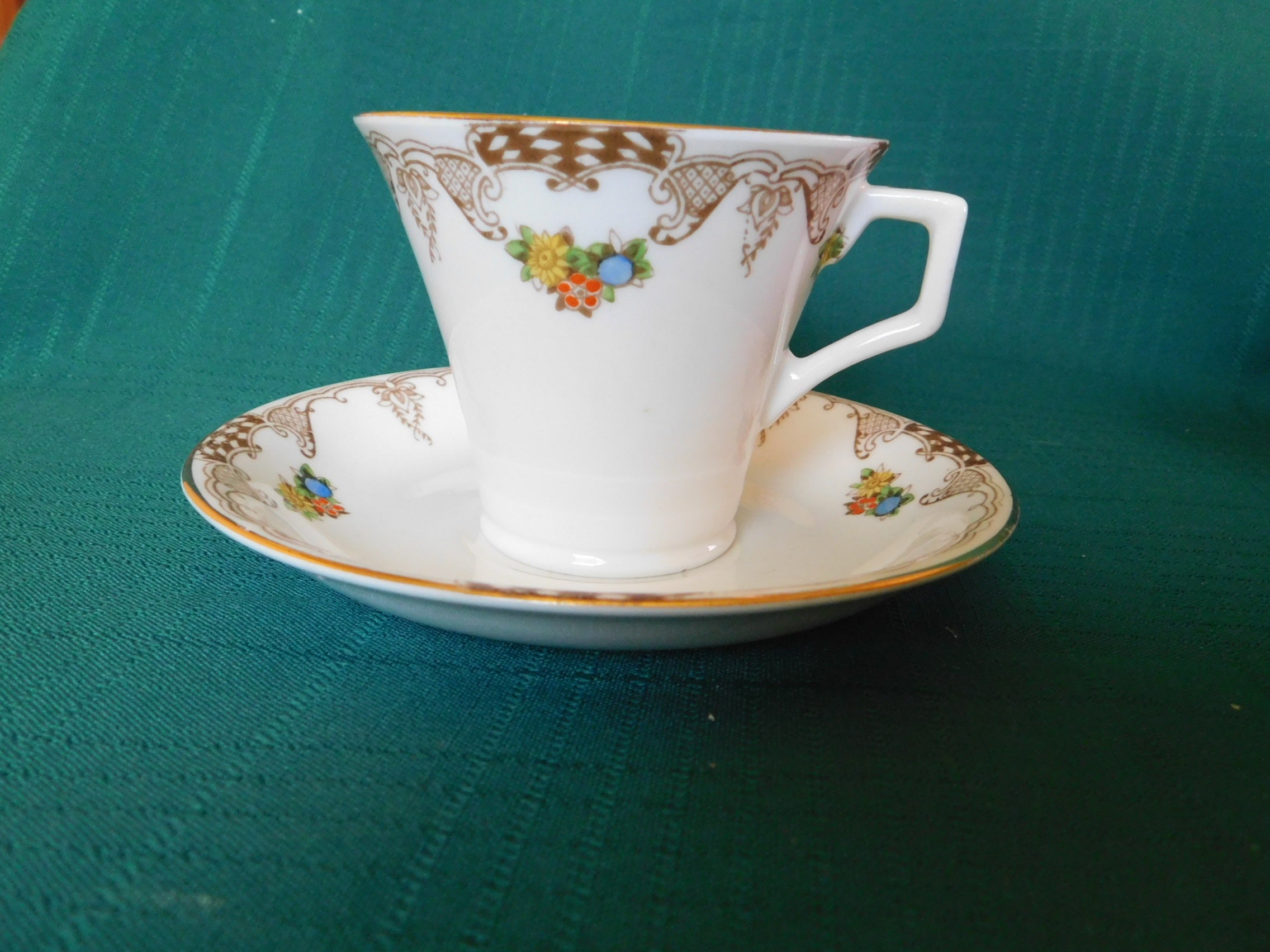 Radfords Joy floral and beige scroll cup and saucer VGU