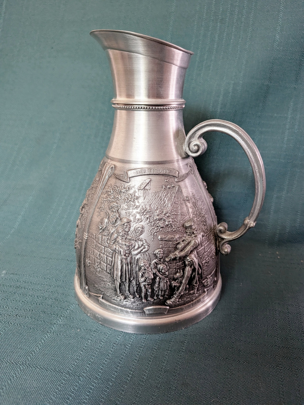 Vintage SKS Zinn 95% Pewter Pitcher, West Germany Relief Village Scene Jug