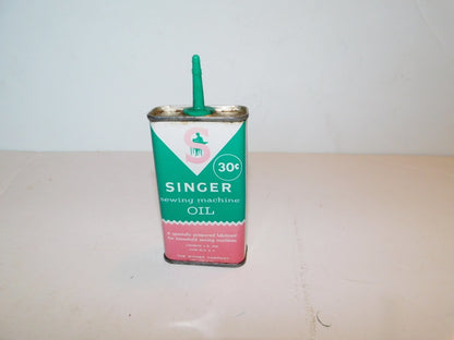 Vintage Singer 4 ounce machine oil 489520 collector tin from U.S.A.