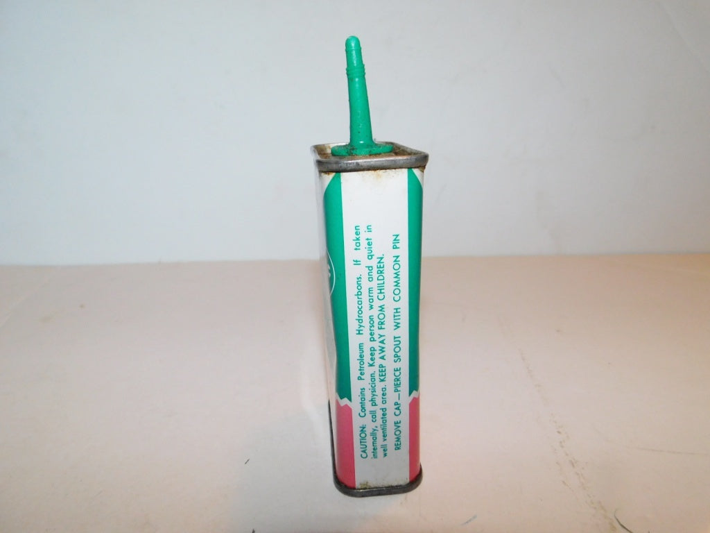 Vintage Singer 4 ounce machine oil 489520 collector tin from U.S.A.