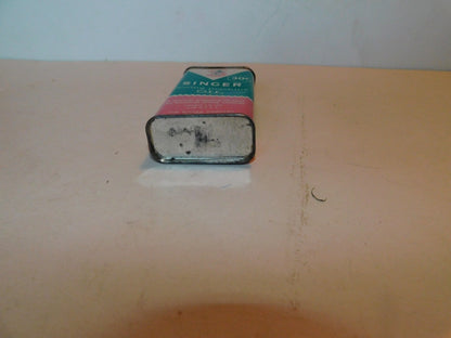 Vintage Singer 4 ounce machine oil 489520 collector tin from U.S.A.