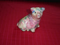 Attentive glazed paper mache pig