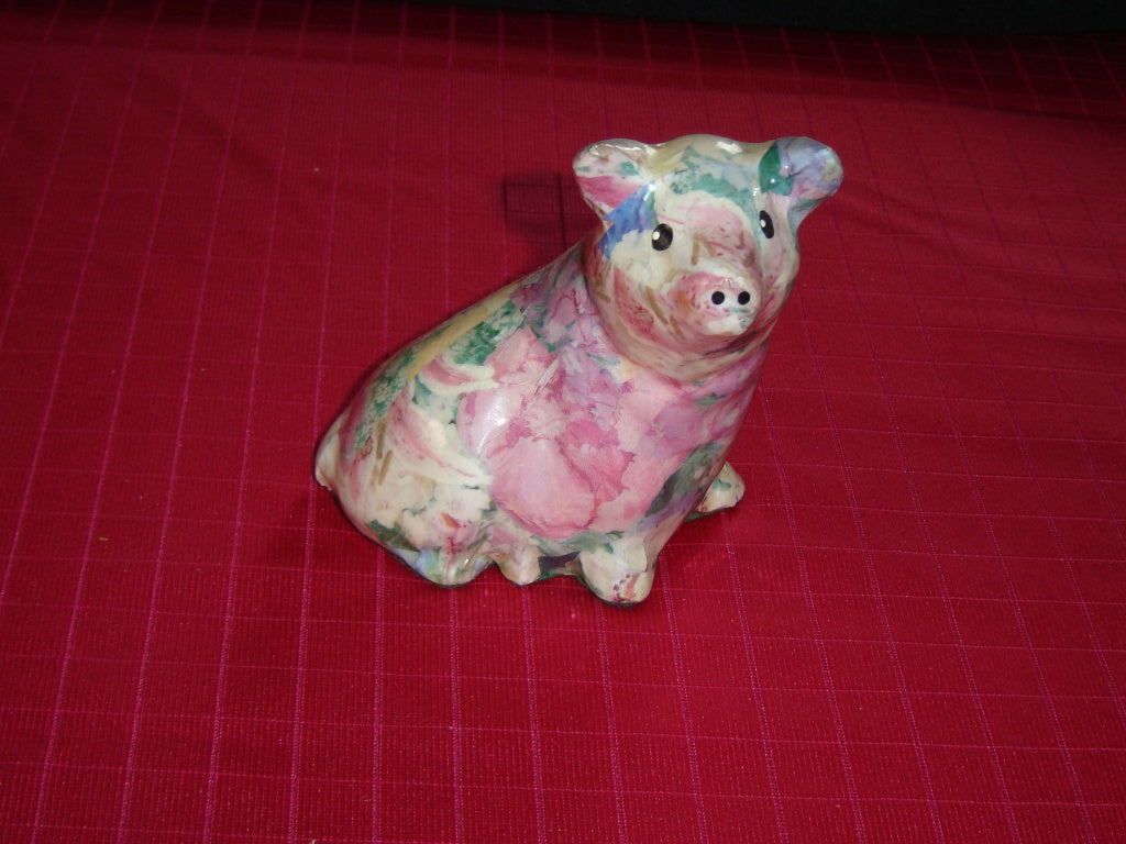 Attentive glazed paper mache pig