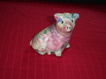 Attentive glazed paper mache pig