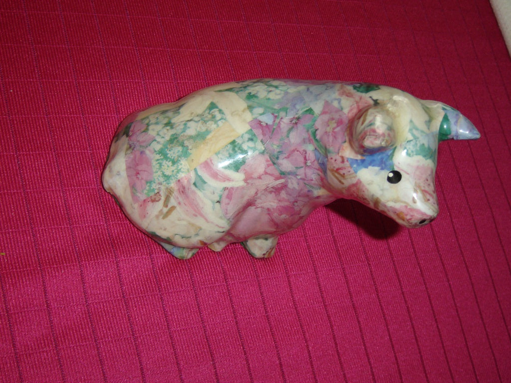 Attentive glazed paper mache pig