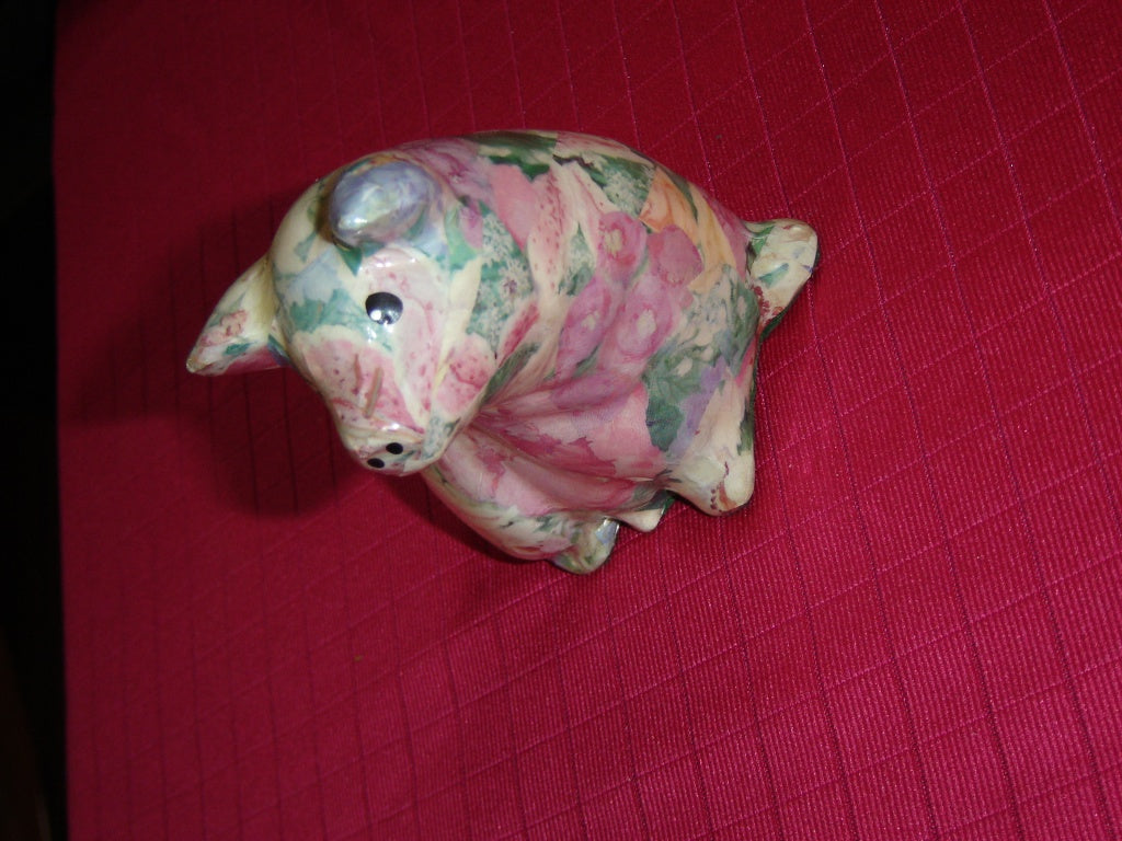 Attentive glazed paper mache pig