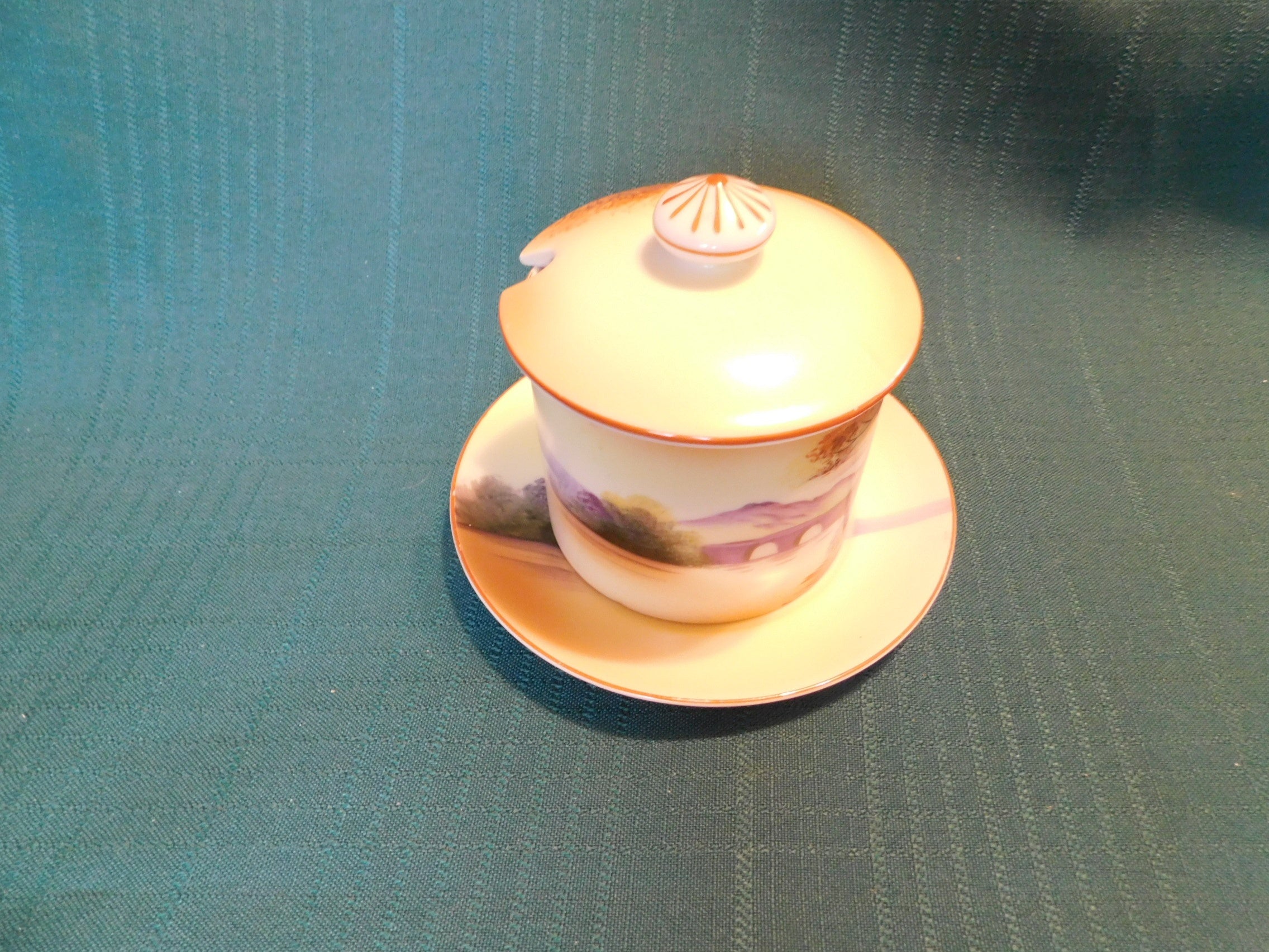 Antique Noritake M (1911) bridge scene lidded condiment jar with underplate VGU