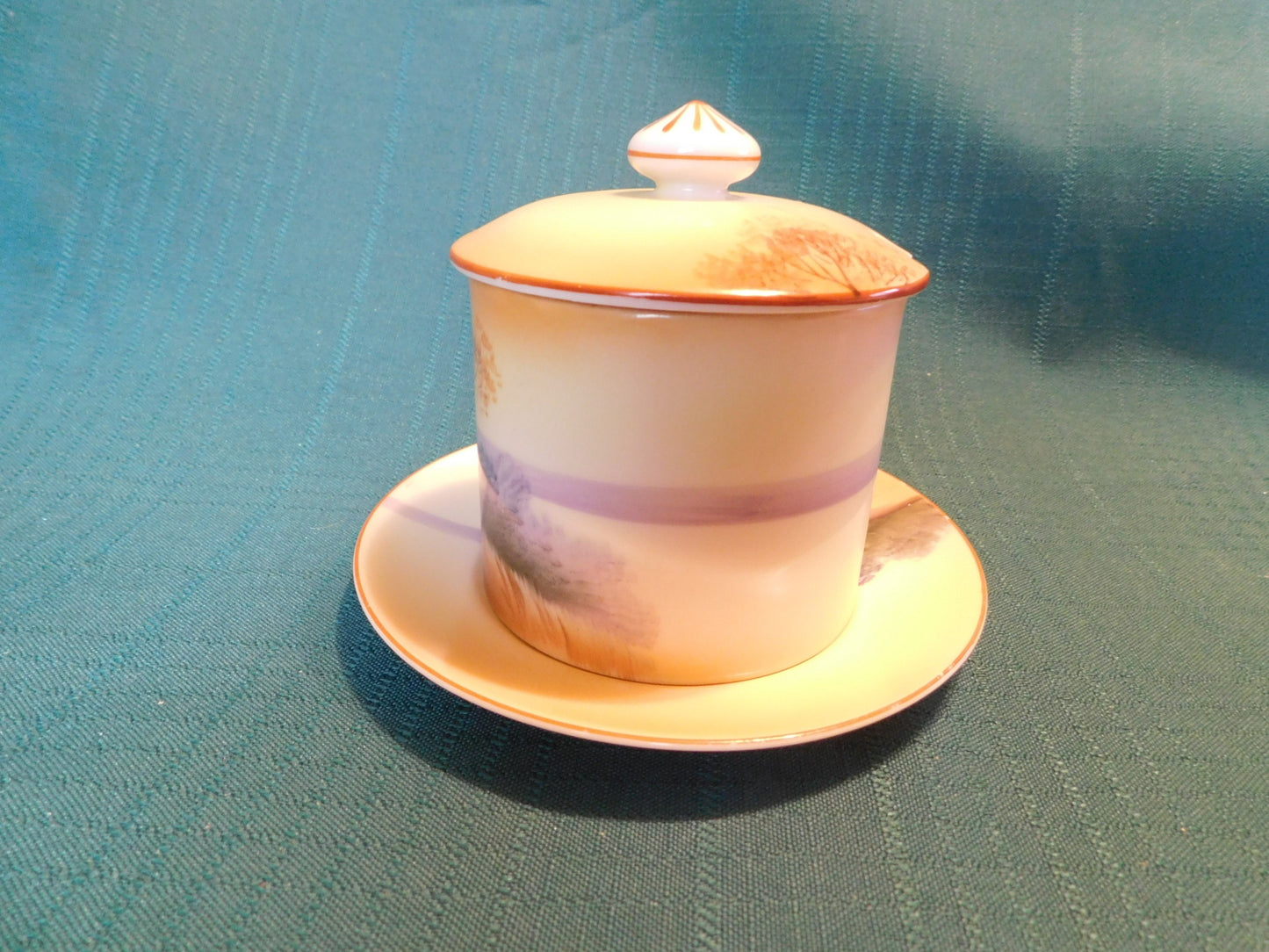 Antique Noritake M (1911) bridge scene lidded condiment jar with underplate VGU