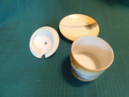 Antique Noritake M (1911) bridge scene lidded condiment jar with underplate VGU