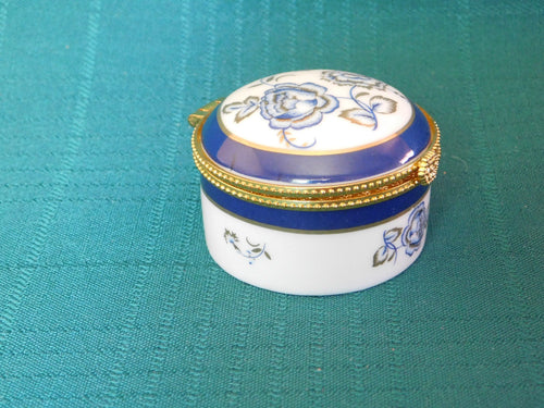 Vintage Porcelain Trinket Box with Floral Design mint condition Unknown