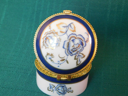 Vintage Porcelain Trinket Box with Floral Design mint condition Unknown