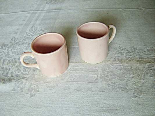 Pair of hand painted pink U.S.A. demitasse mugs near mint condition