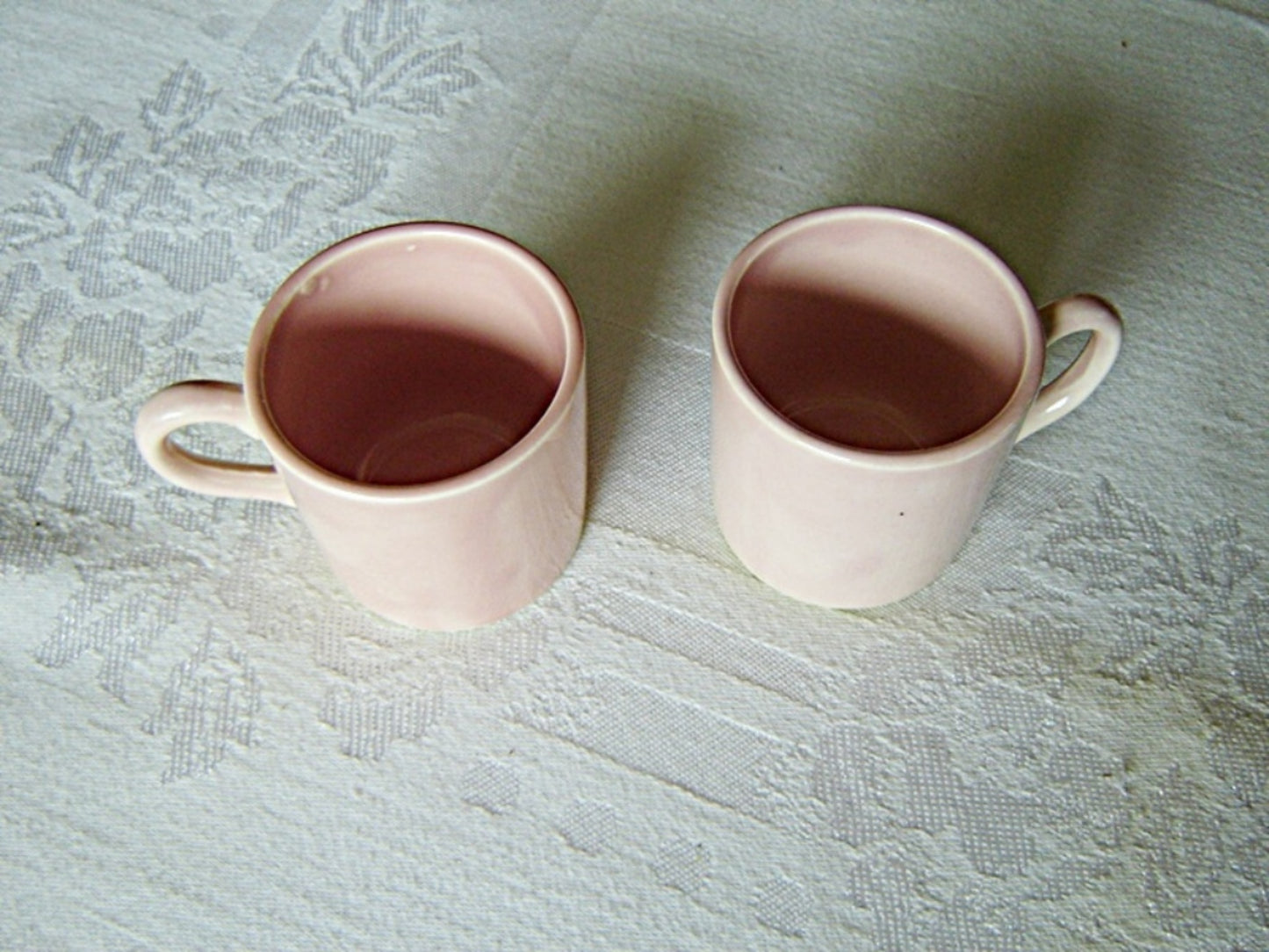 Pair of hand painted pink U.S.A. demitasse mugs near mint condition