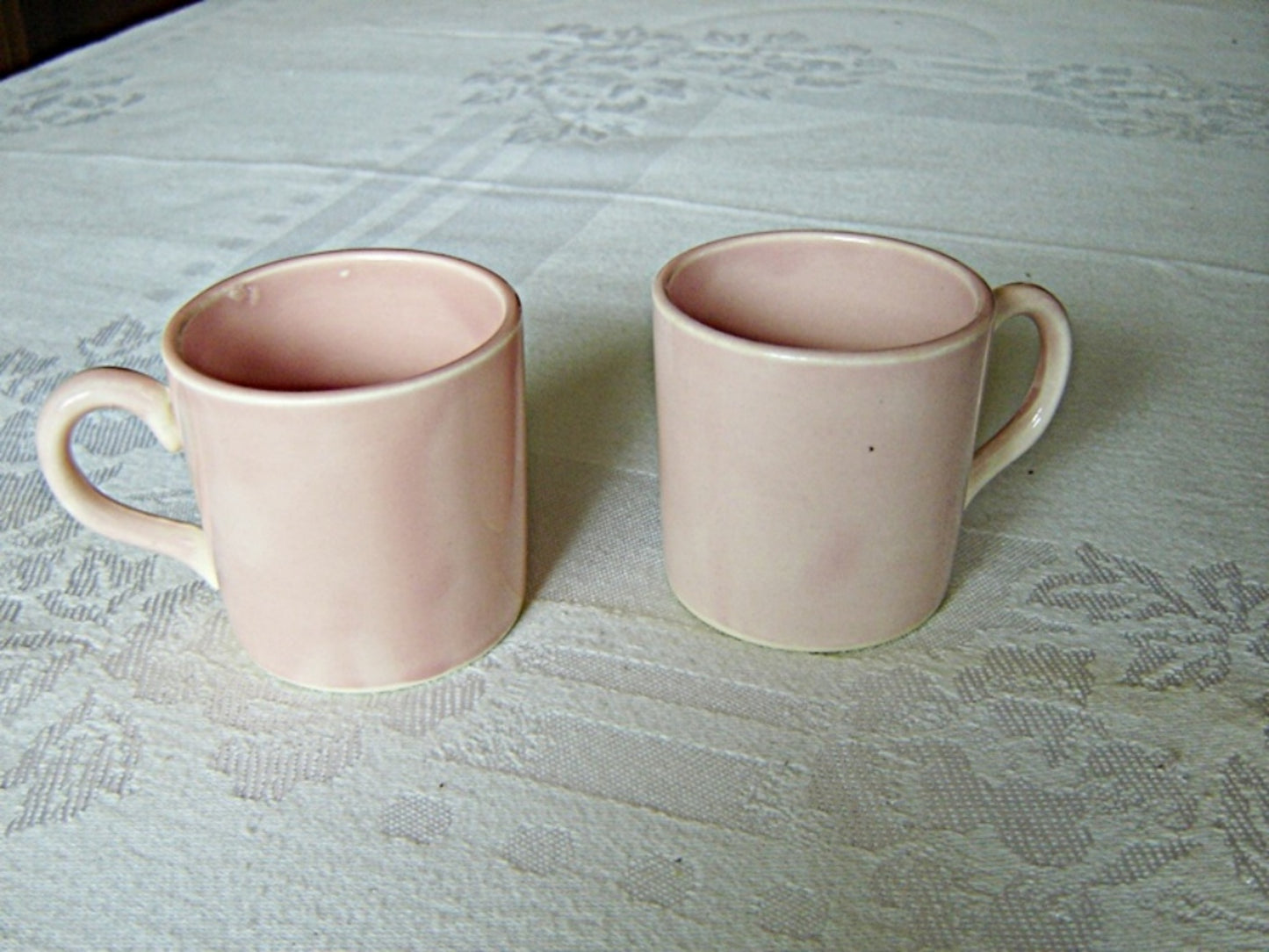 Pair of hand painted pink U.S.A. demitasse mugs near mint condition