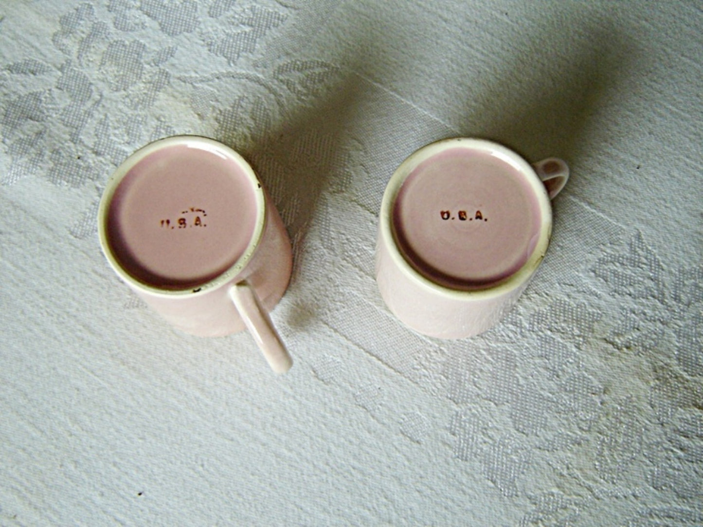 Pair of hand painted pink U.S.A. demitasse mugs near mint condition