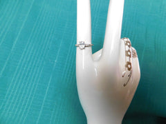 Ladies' sterling silver ring size 9 clear jewel with rectangle side jewels mint condition