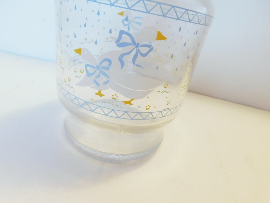 Retro look lidded glass storage container with Goose pattern near mint condition